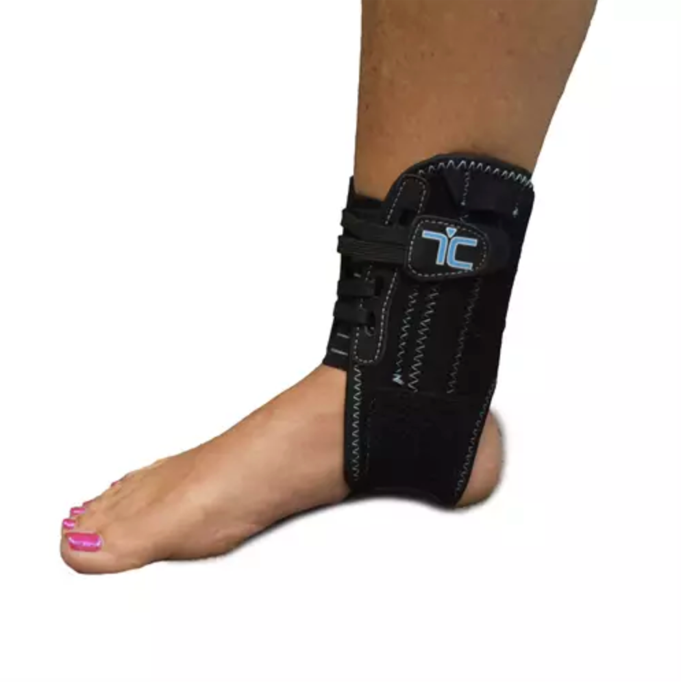 TRAINERS CHOICE l ADJUSTABLE COMPRESSION l ANKLE STABILIZER l UNIVERSAL